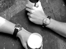 Two people with watches