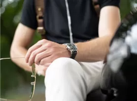 Man sitting with a watch