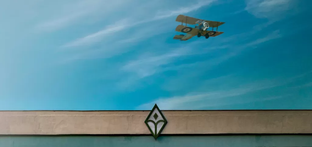Sky with plane and Bulief logo